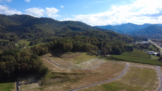 Drone view of rolling hills and mountains
