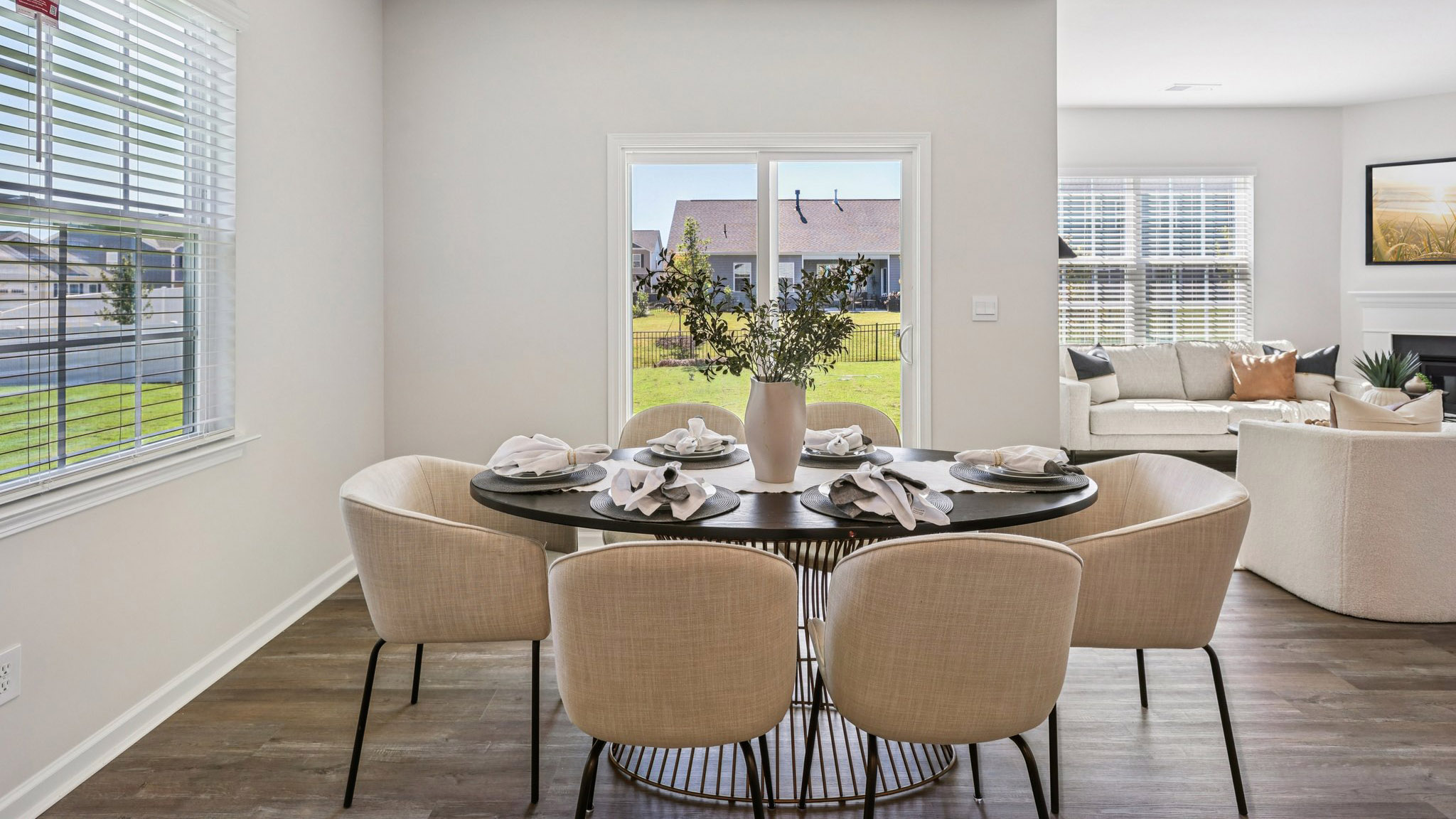 Dining are with living area in background