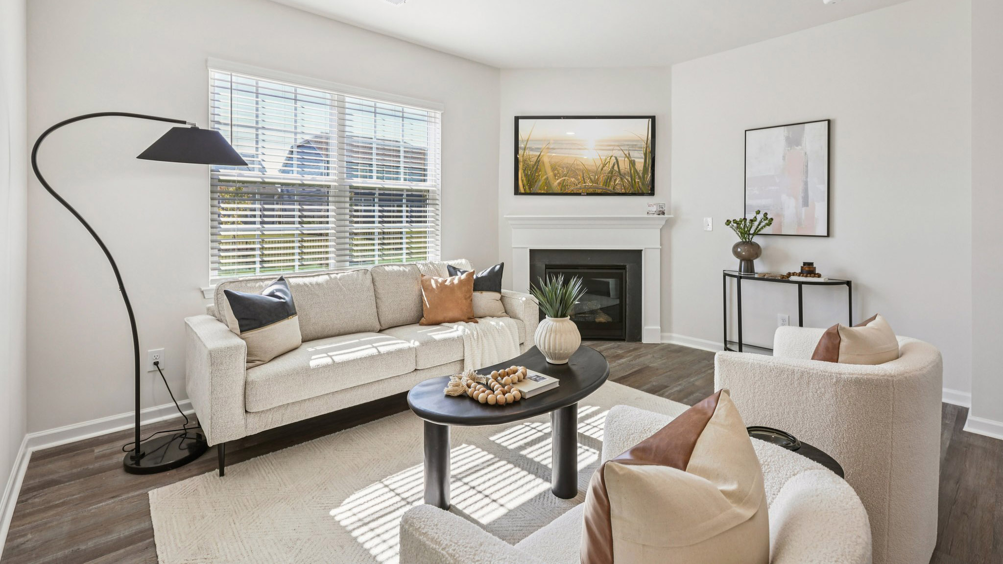 Living are with windows and fireplace