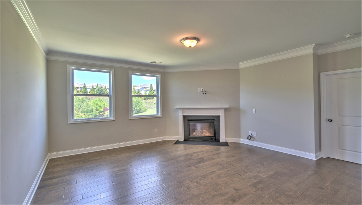 Open concept living and dining space with sliding glass door