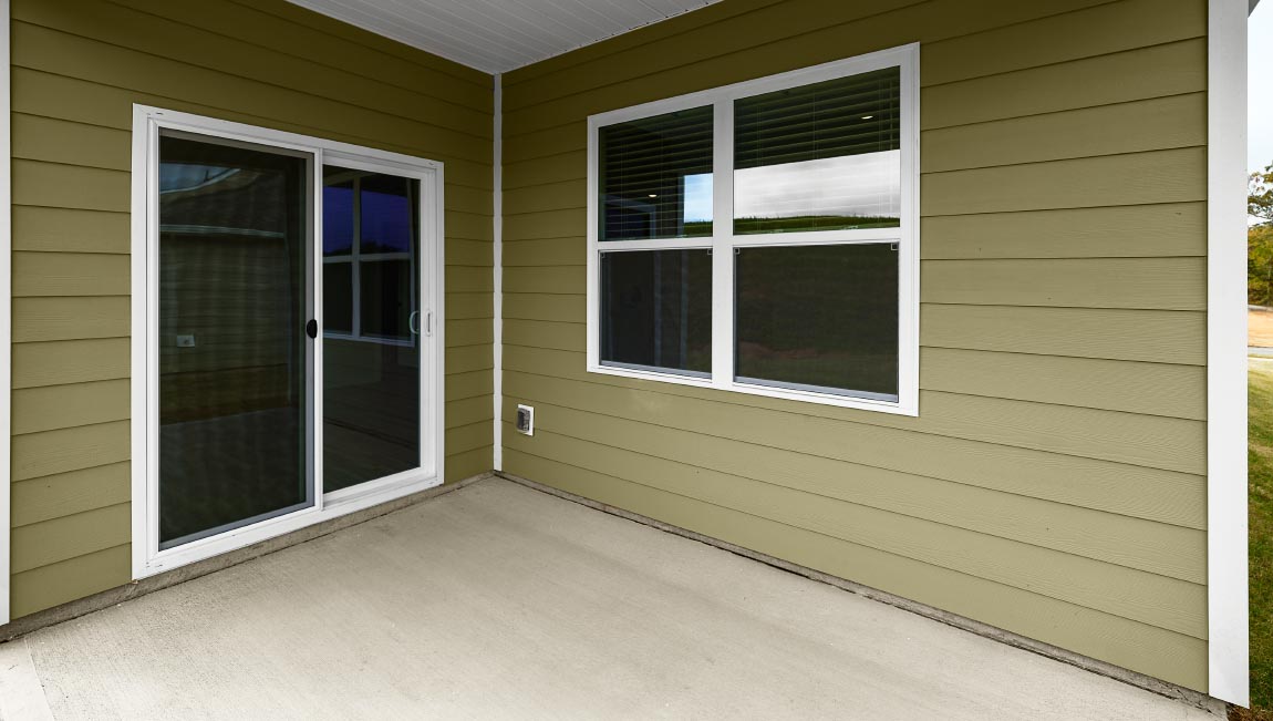 Back patio with sliding glass doors