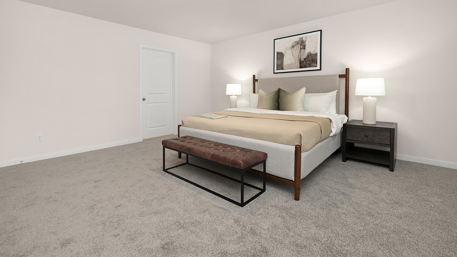 primary bedroom with carpet and two large windows