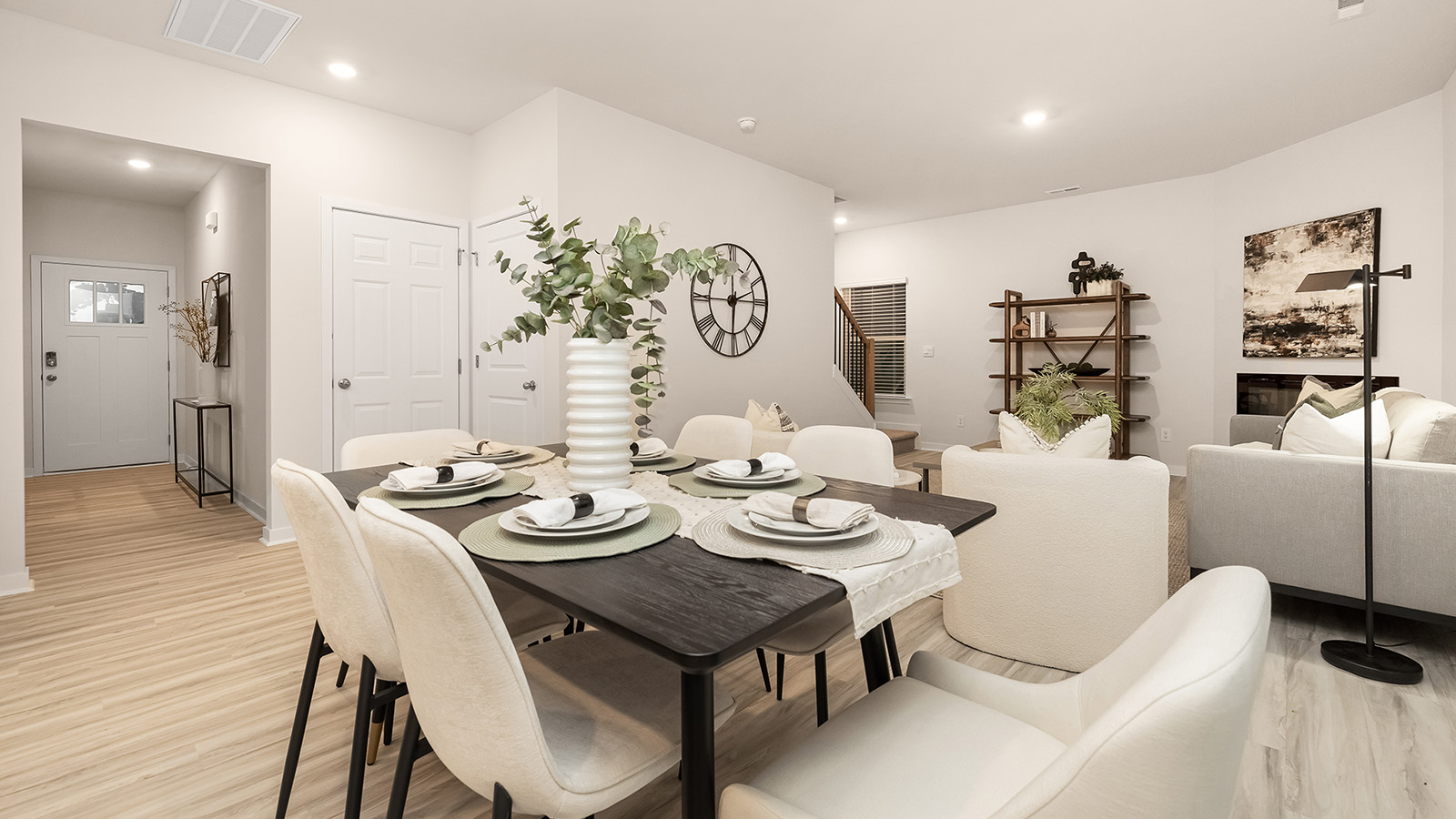 Dining room with wood floors, and sliding glass back door