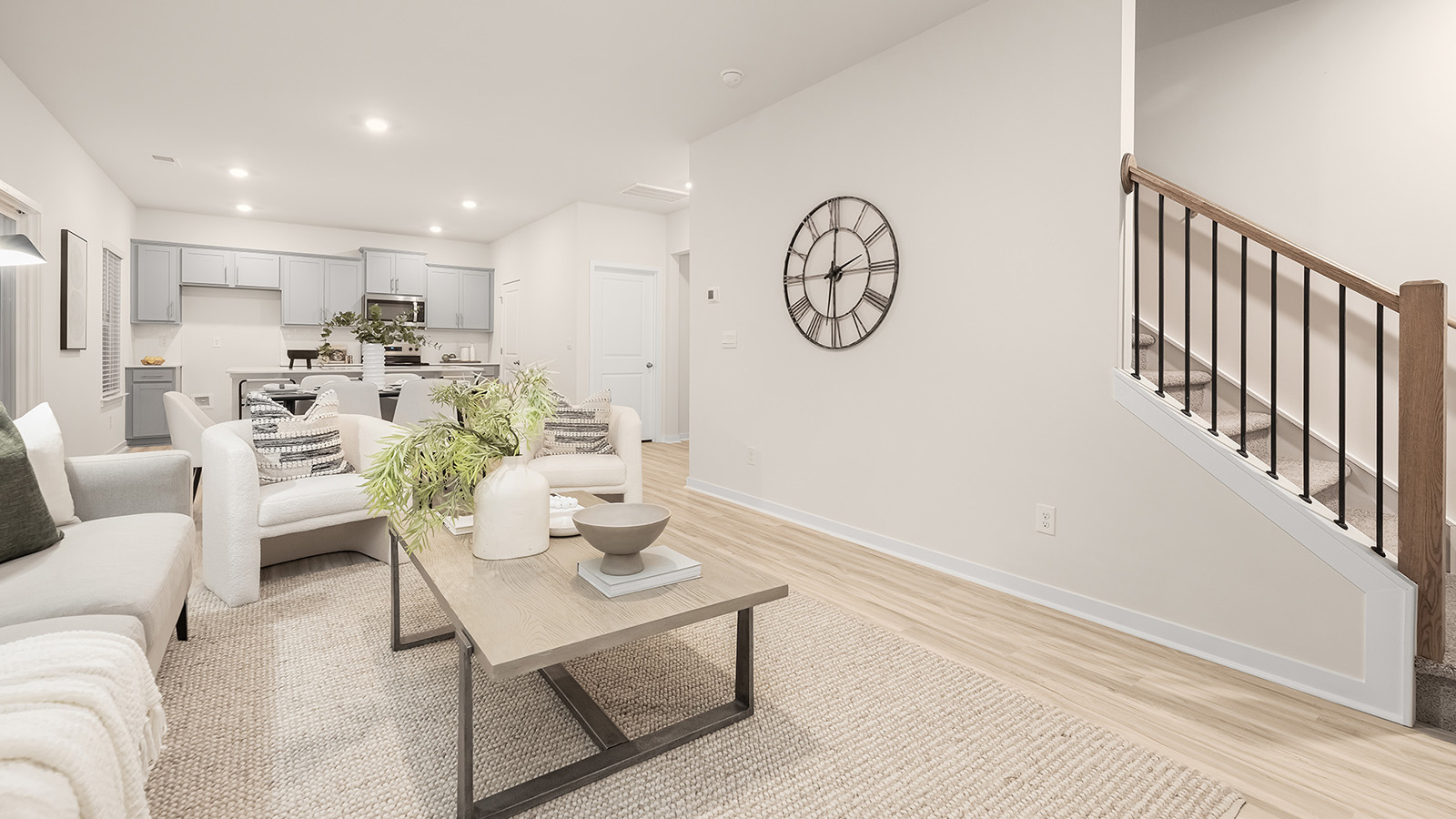living room with electric fireplace and large window