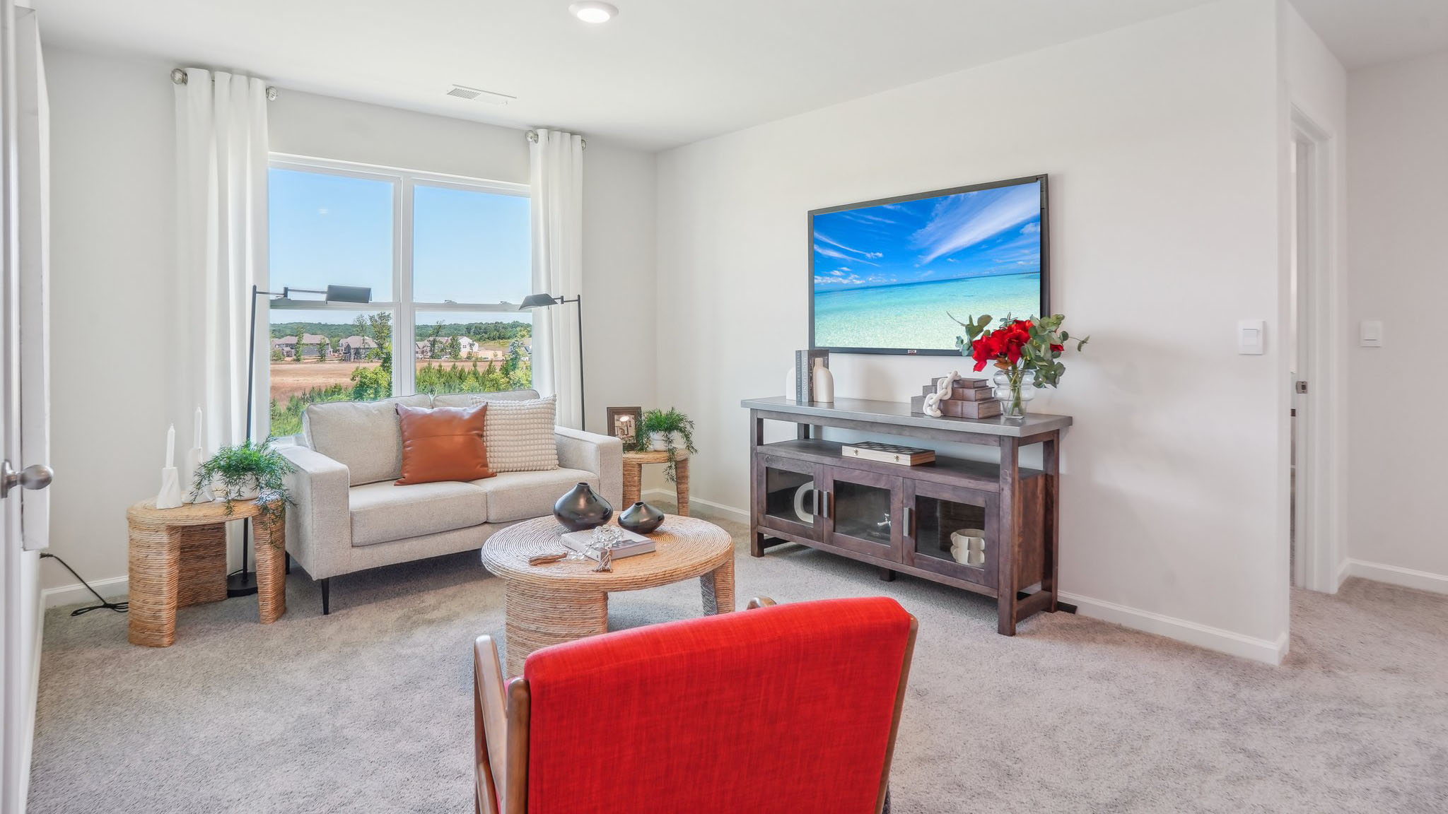 Upstairs living area with large window