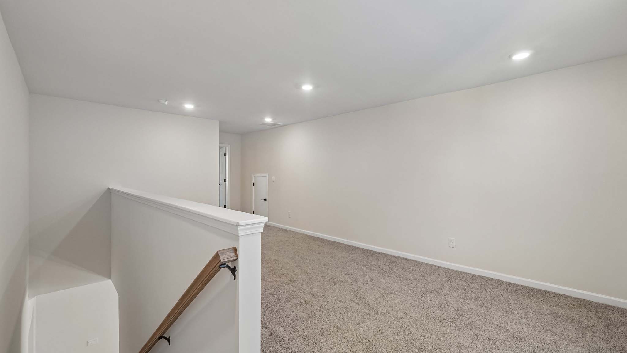 Upstairs carpeted loft