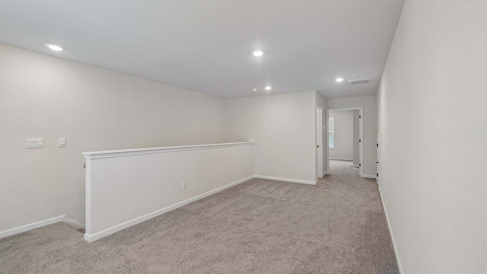 Upstairs carpeted loft