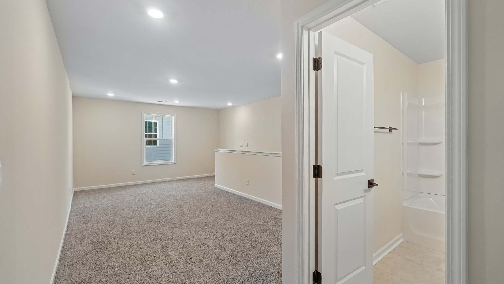 Upstairs carpeted loft