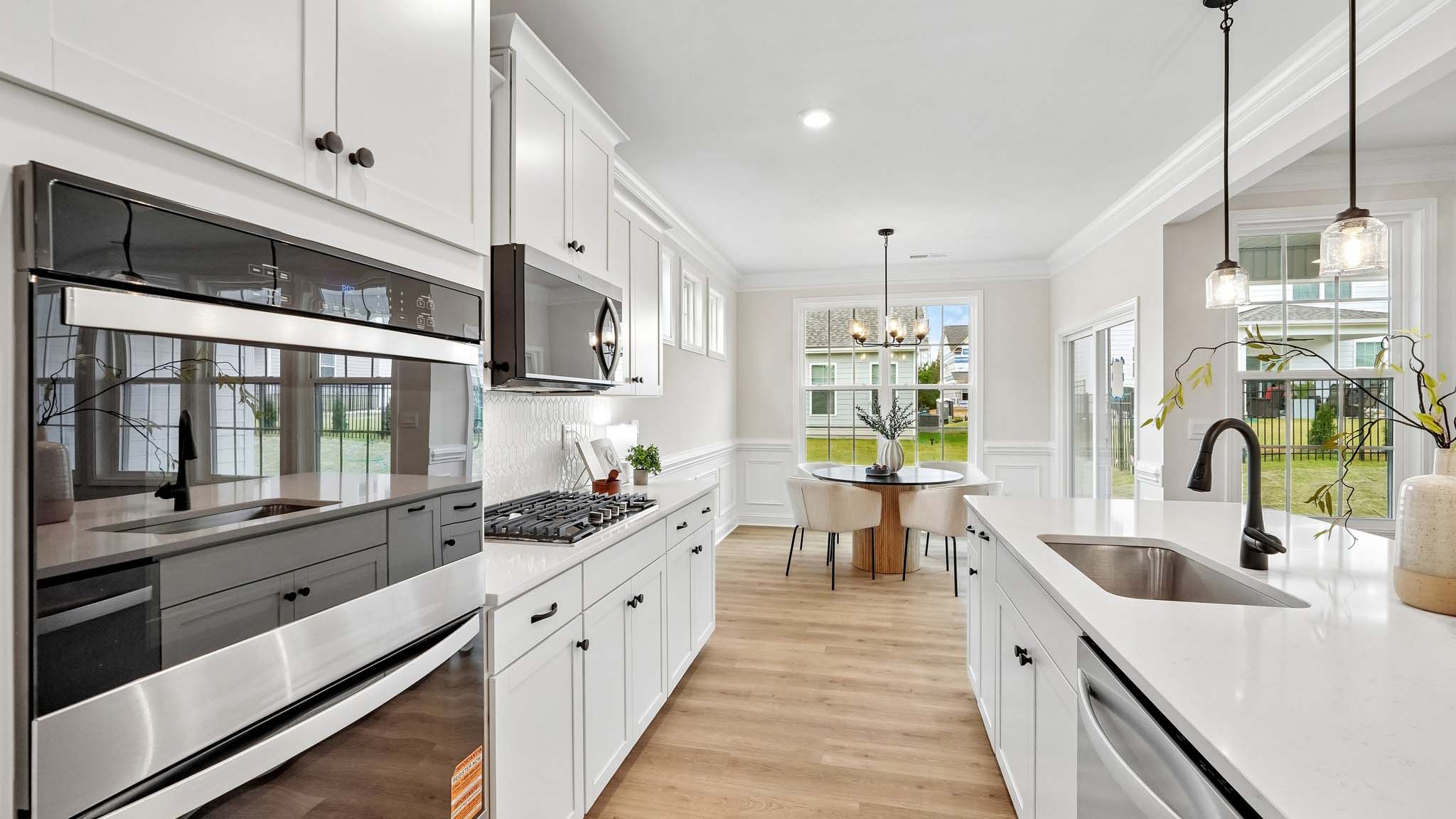 kitchen and island with stainless steel appliances