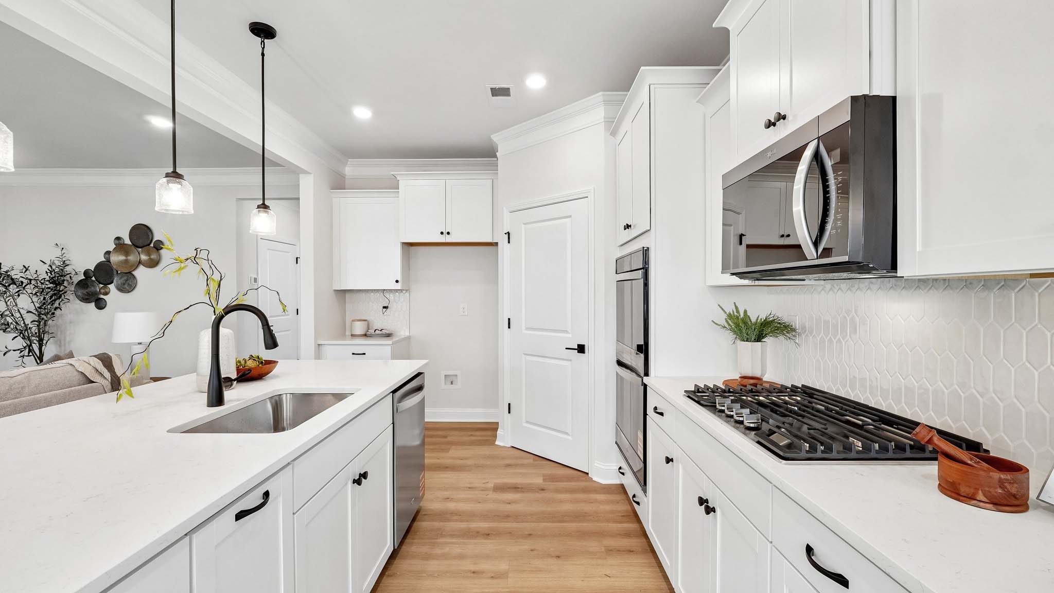 kitchen and island with stainless steel appliances
