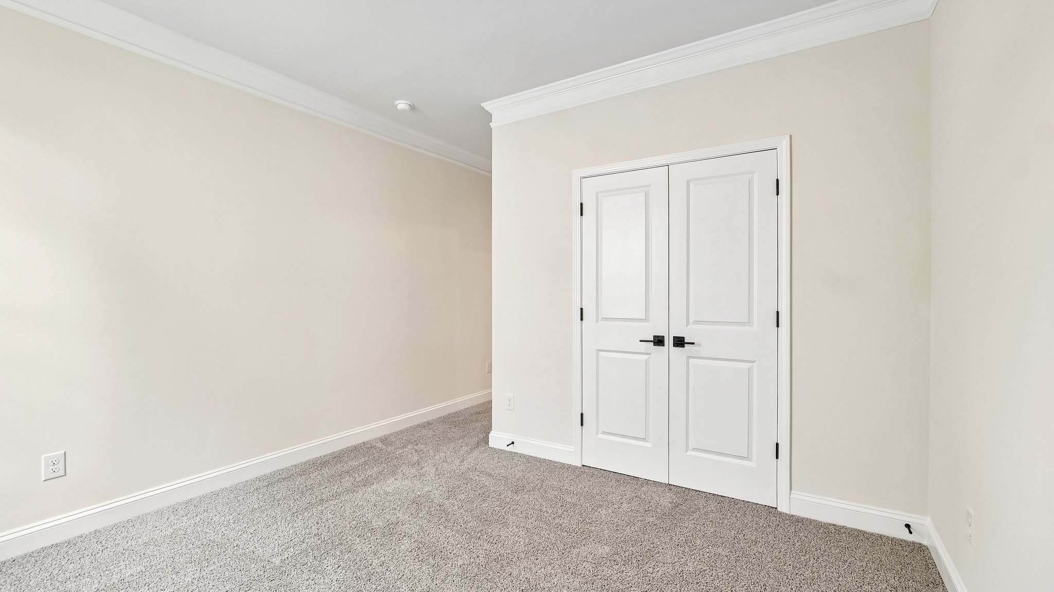 Carpeted bedroom