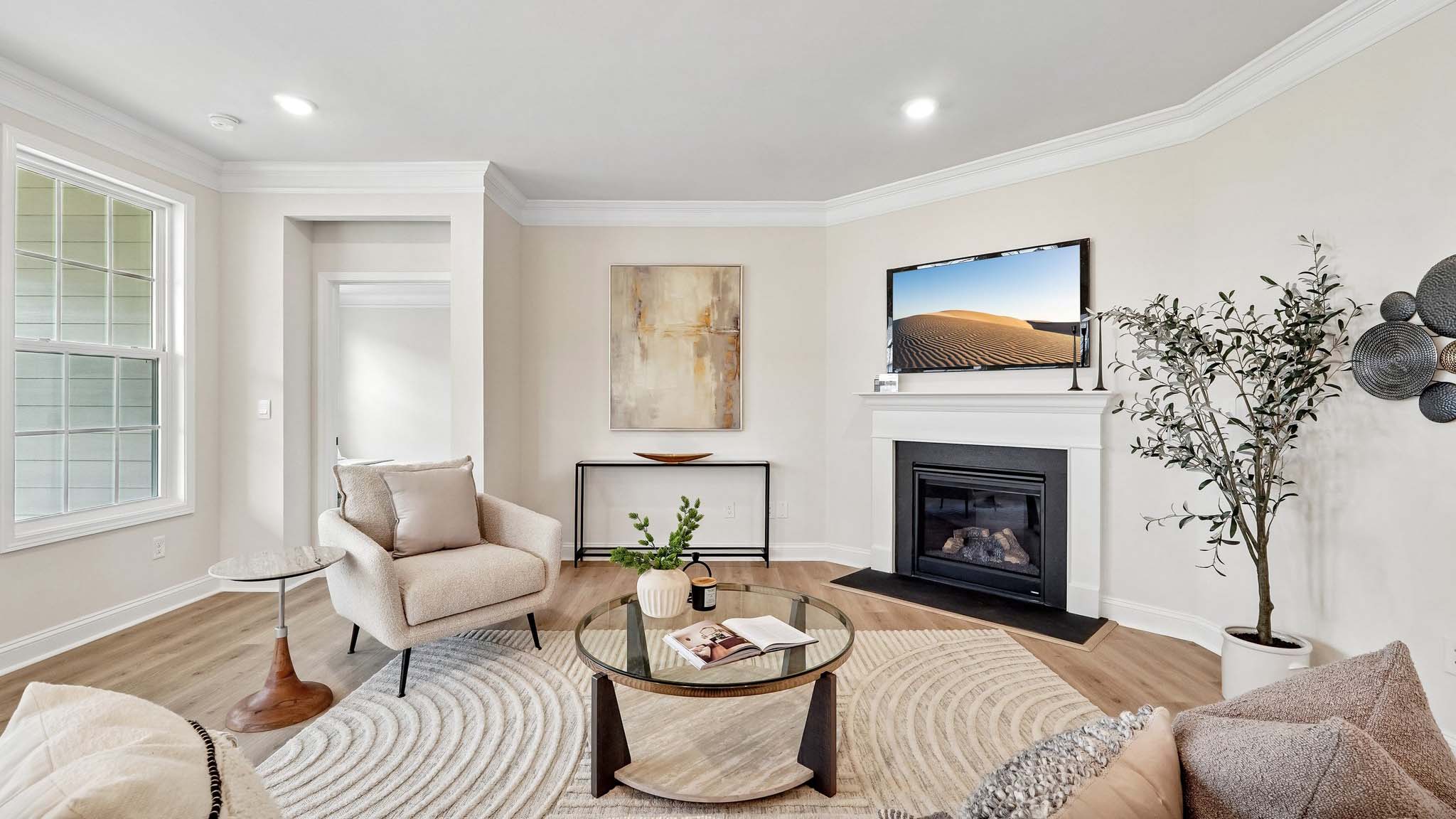 Living room beside kitchen with fireplace