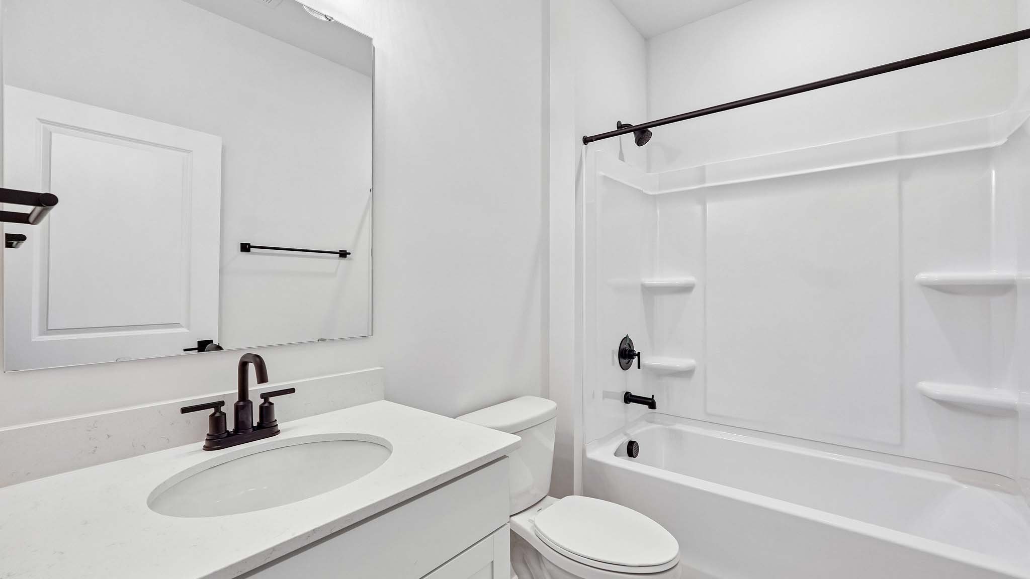 bathroom with bathtub shower combo