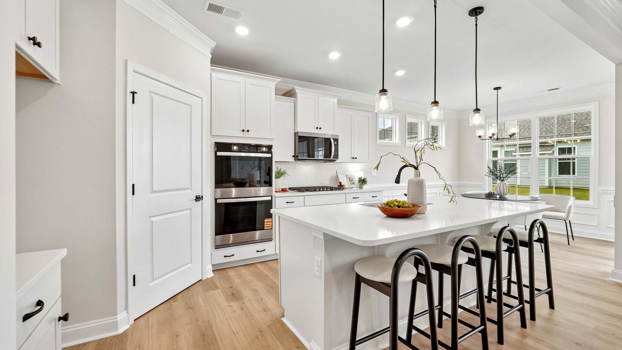 kitchen and island with stainless steel appliances