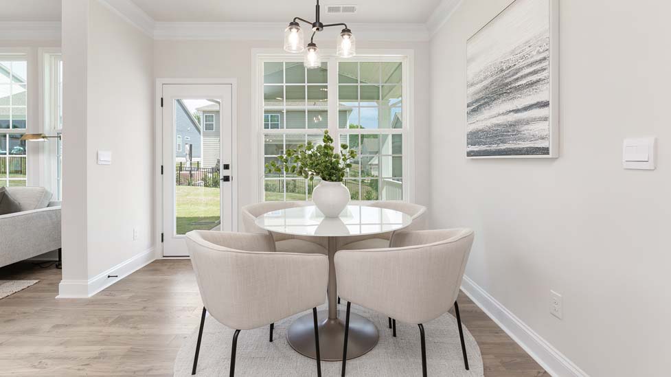 Dining room space with two windows