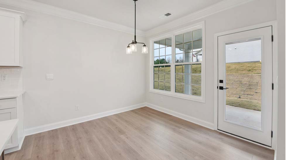 Dining room space with two windows
