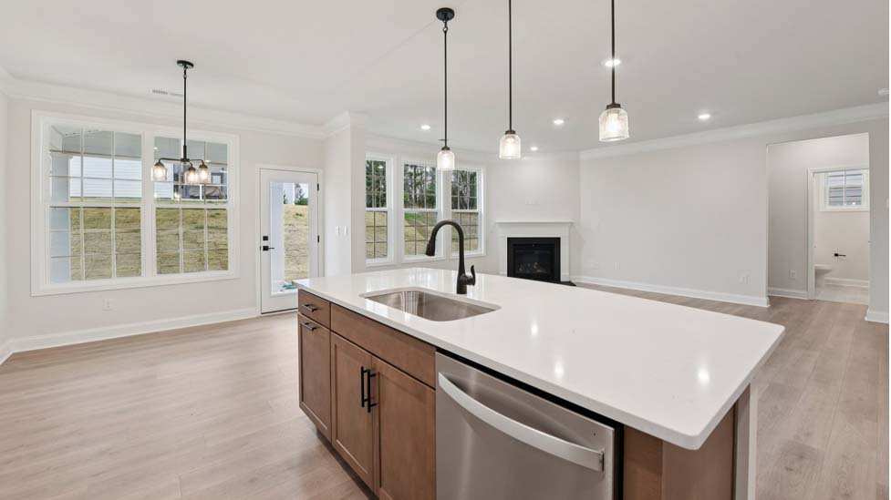 Kitchen and island with white cabinets