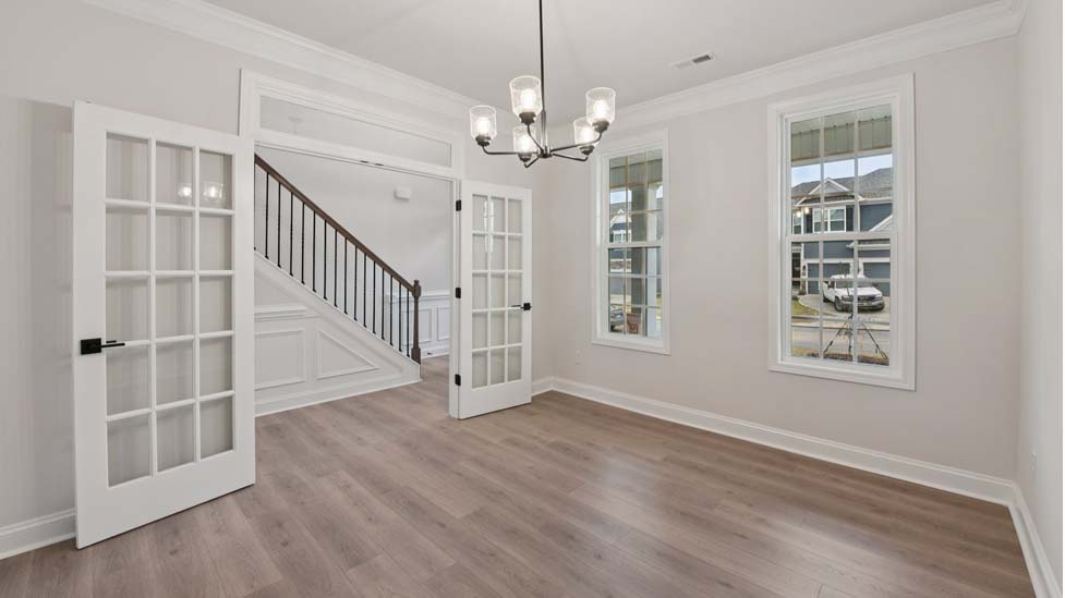 Dining room space with two windows
