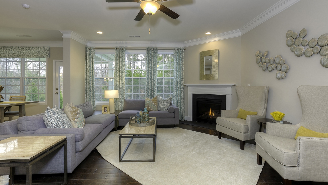 Family room with wood floors and fireplace