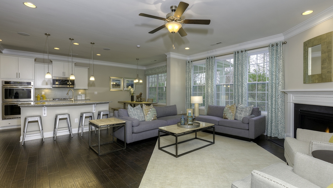 Family room with wood floors and fireplace