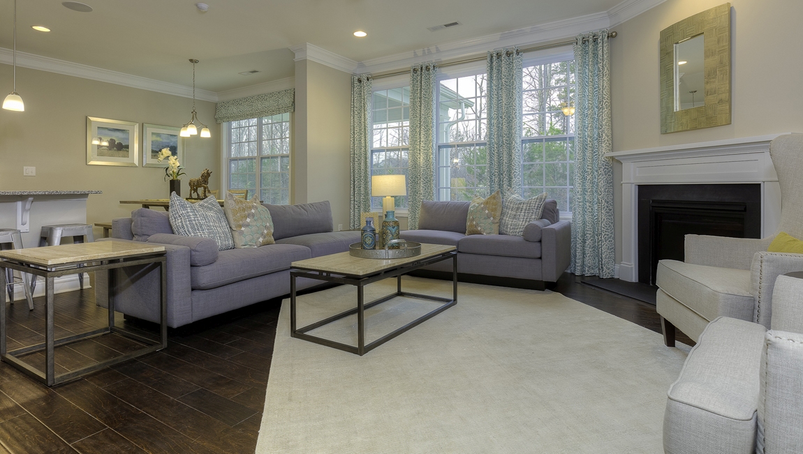 Family room with wood floors and fireplace