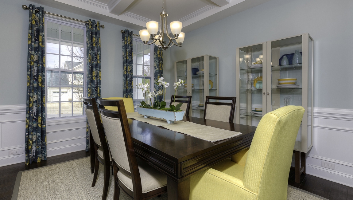 Dining room space with two windows