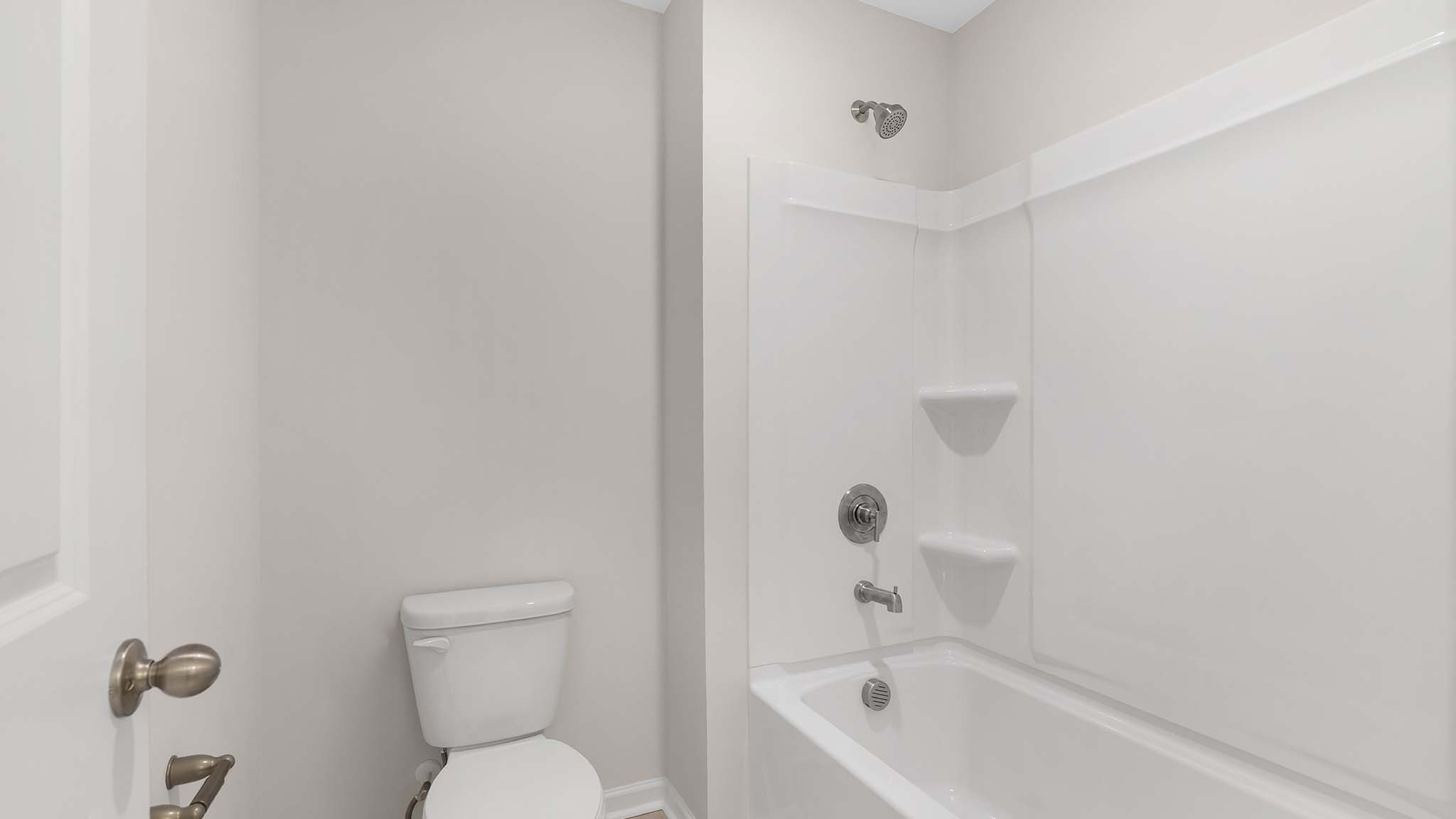 Bathroom with white cabinets