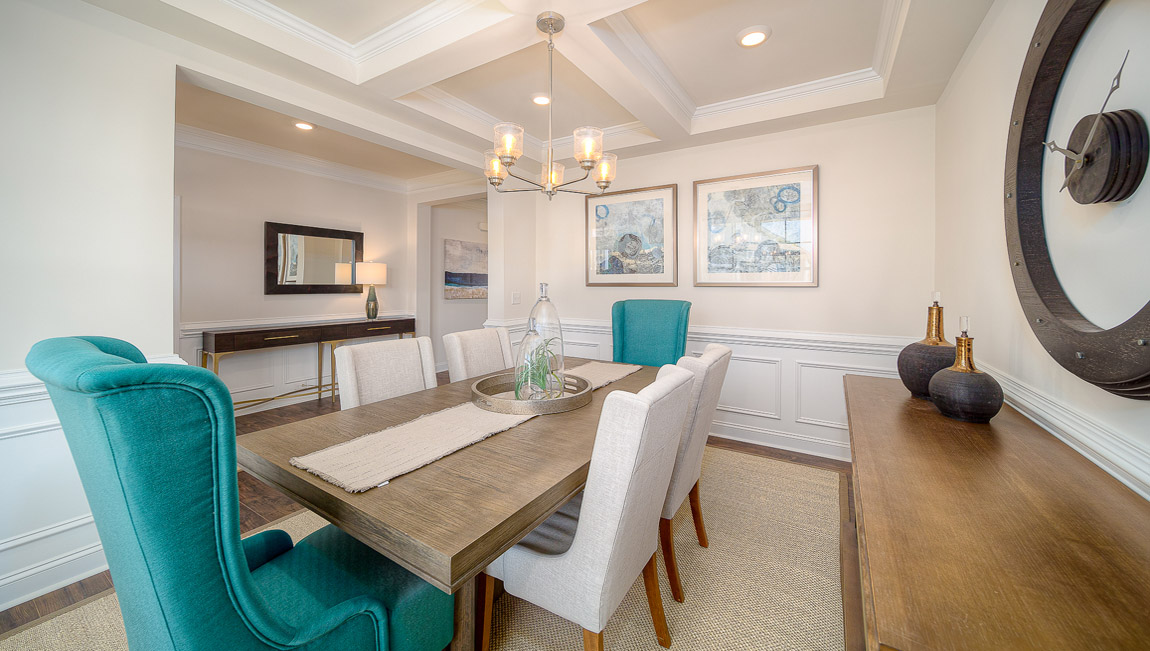 Dining room with wood floors, and large window