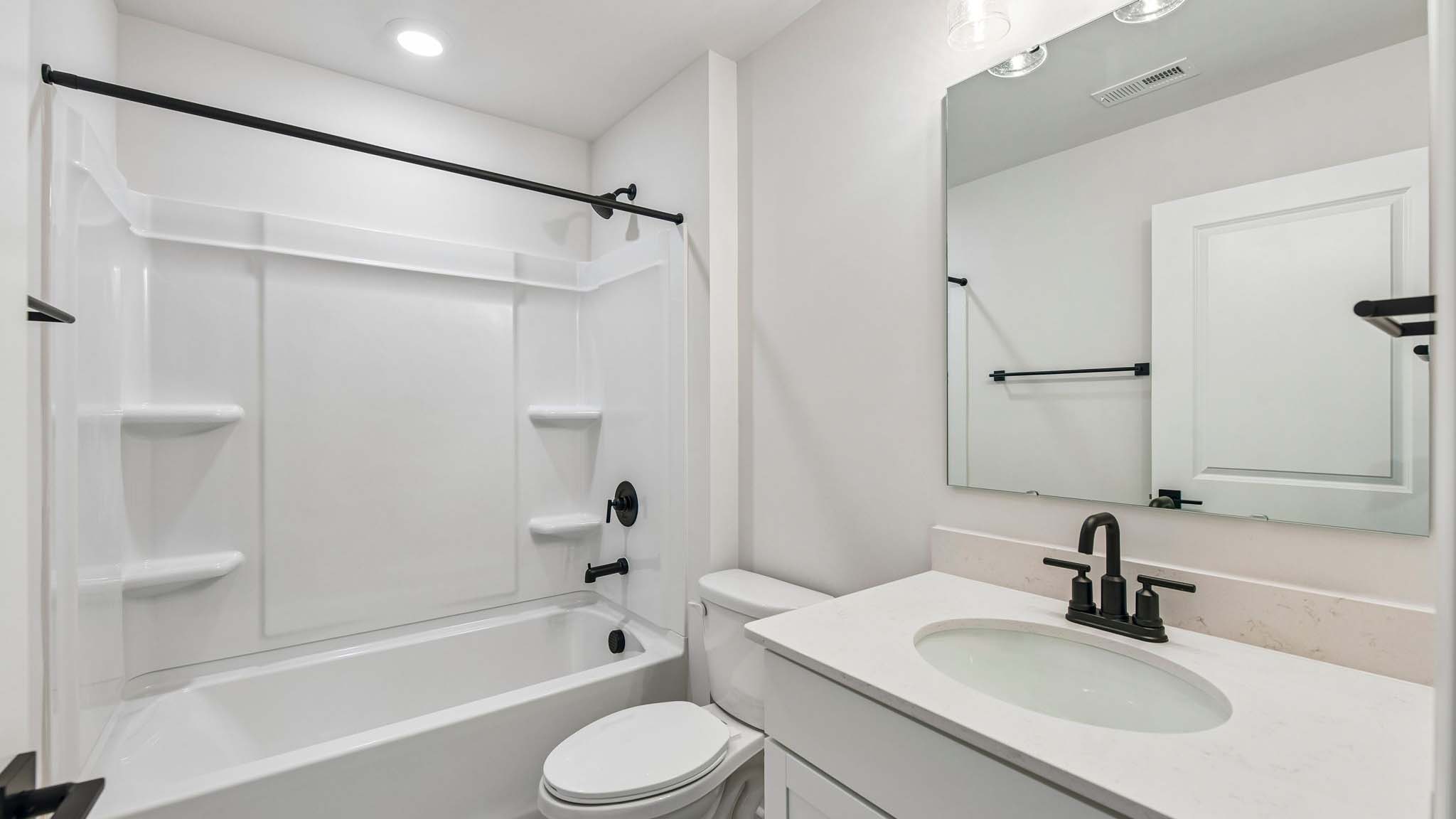 Bathroom with tub shower combination