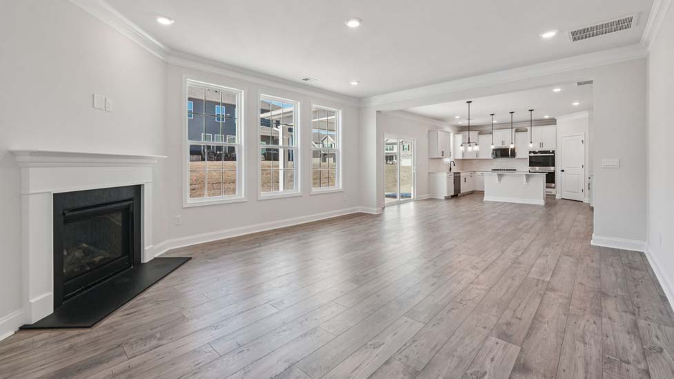 open concept living room with fireplace