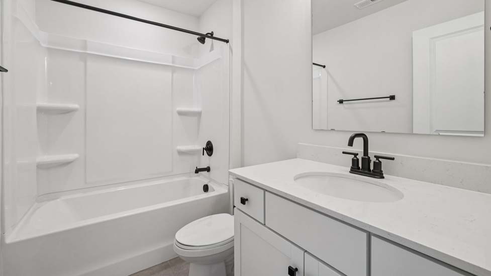 Bathroom with bathtub shower combination