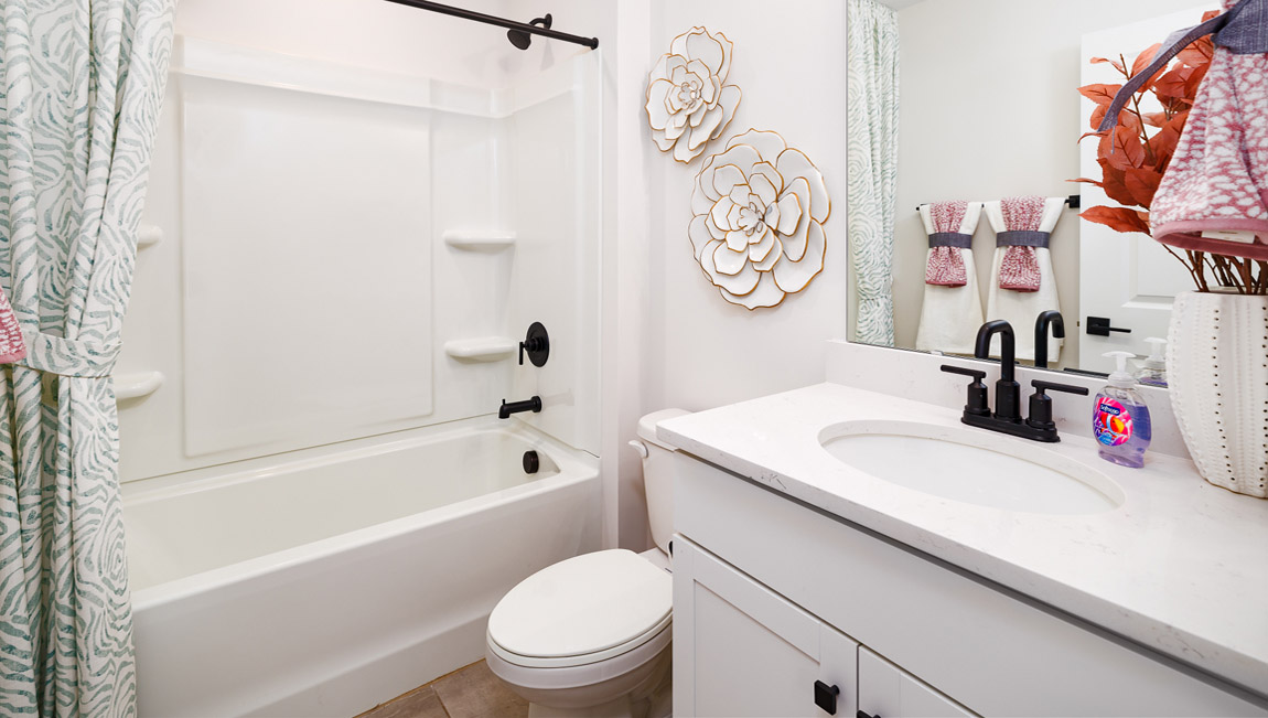 bathroom with tub shower combination