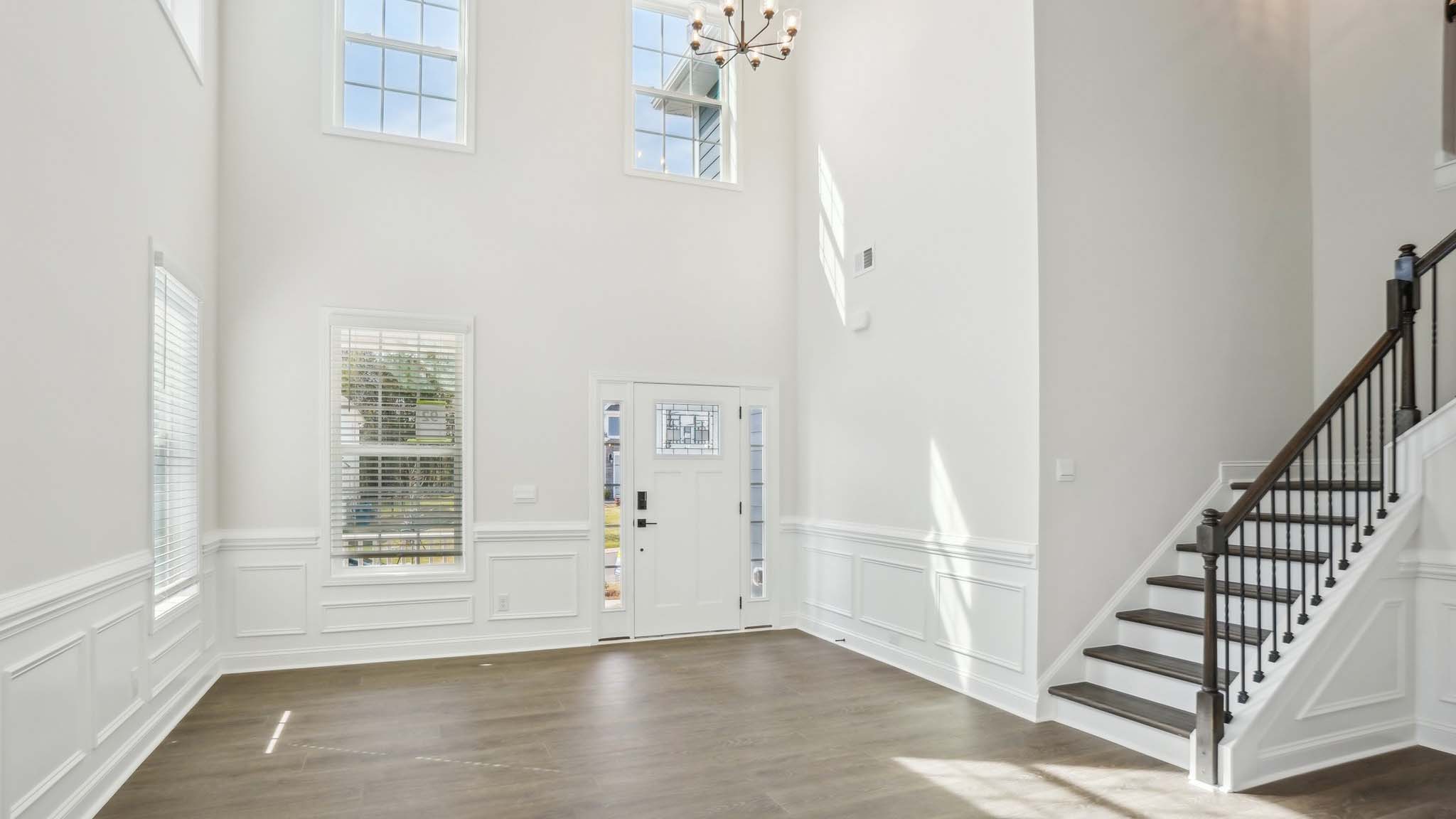 Welcoming foyer with staircase