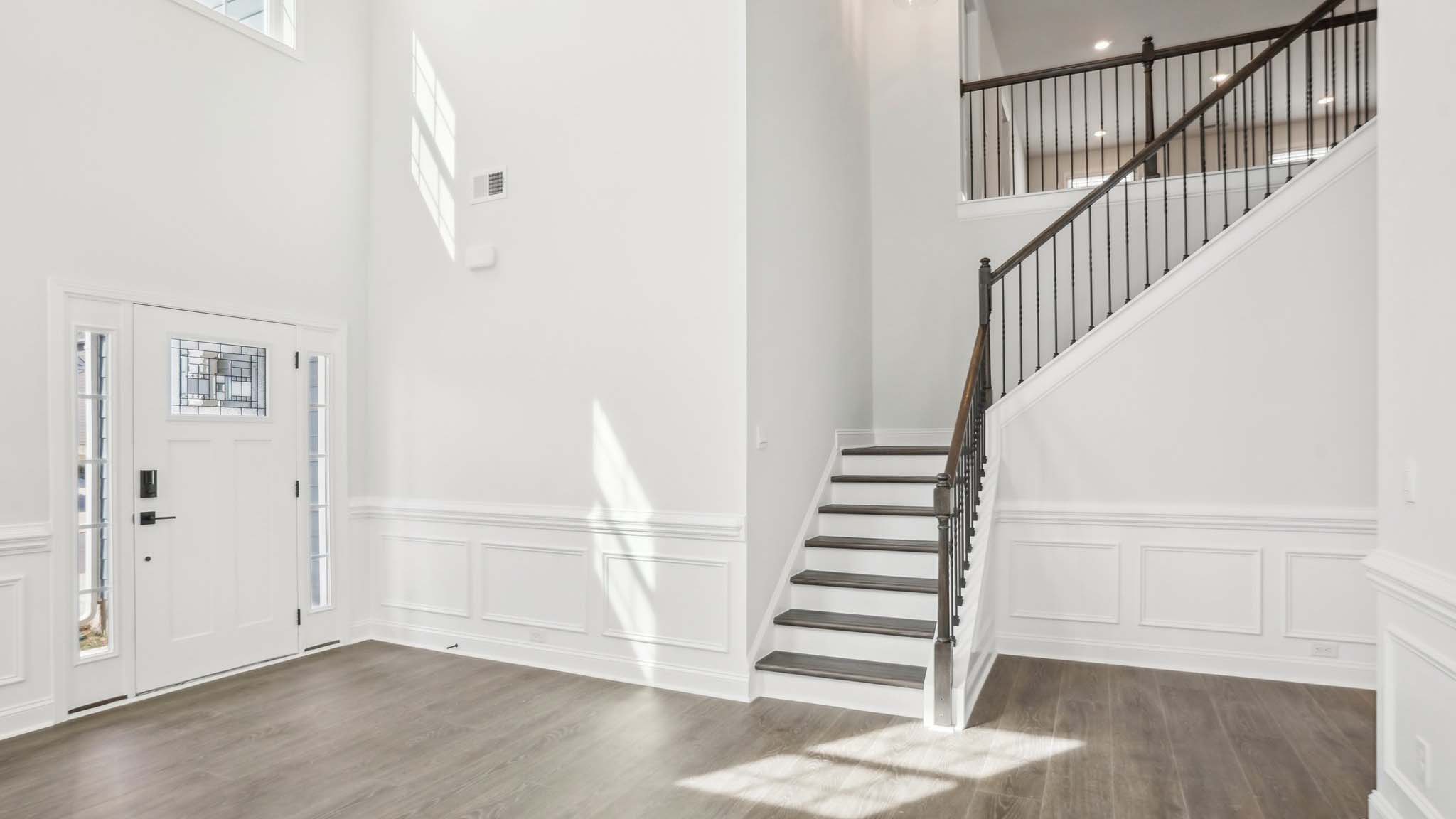 Welcoming foyer with staircase