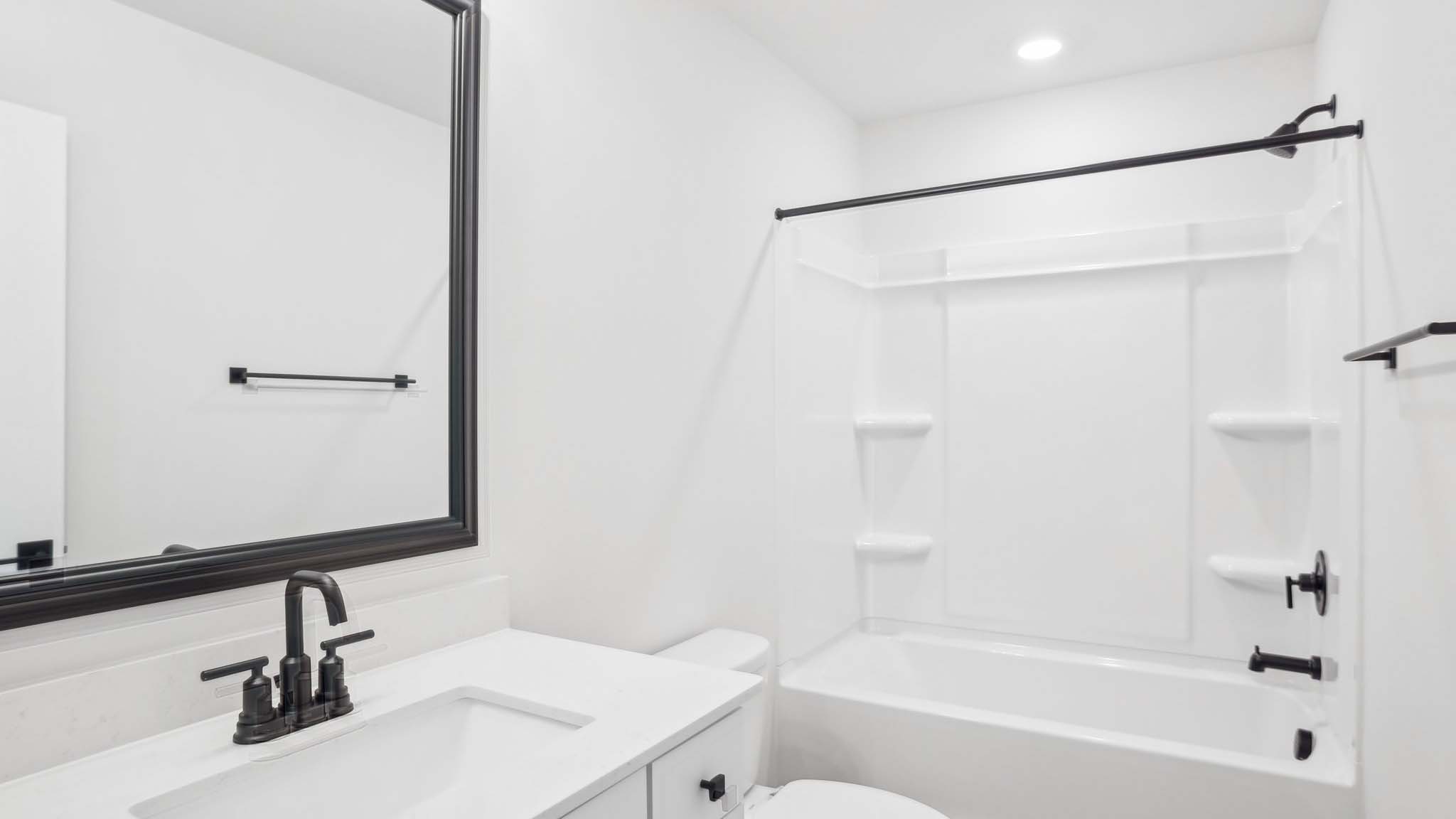 Bathroom with brown cabinets