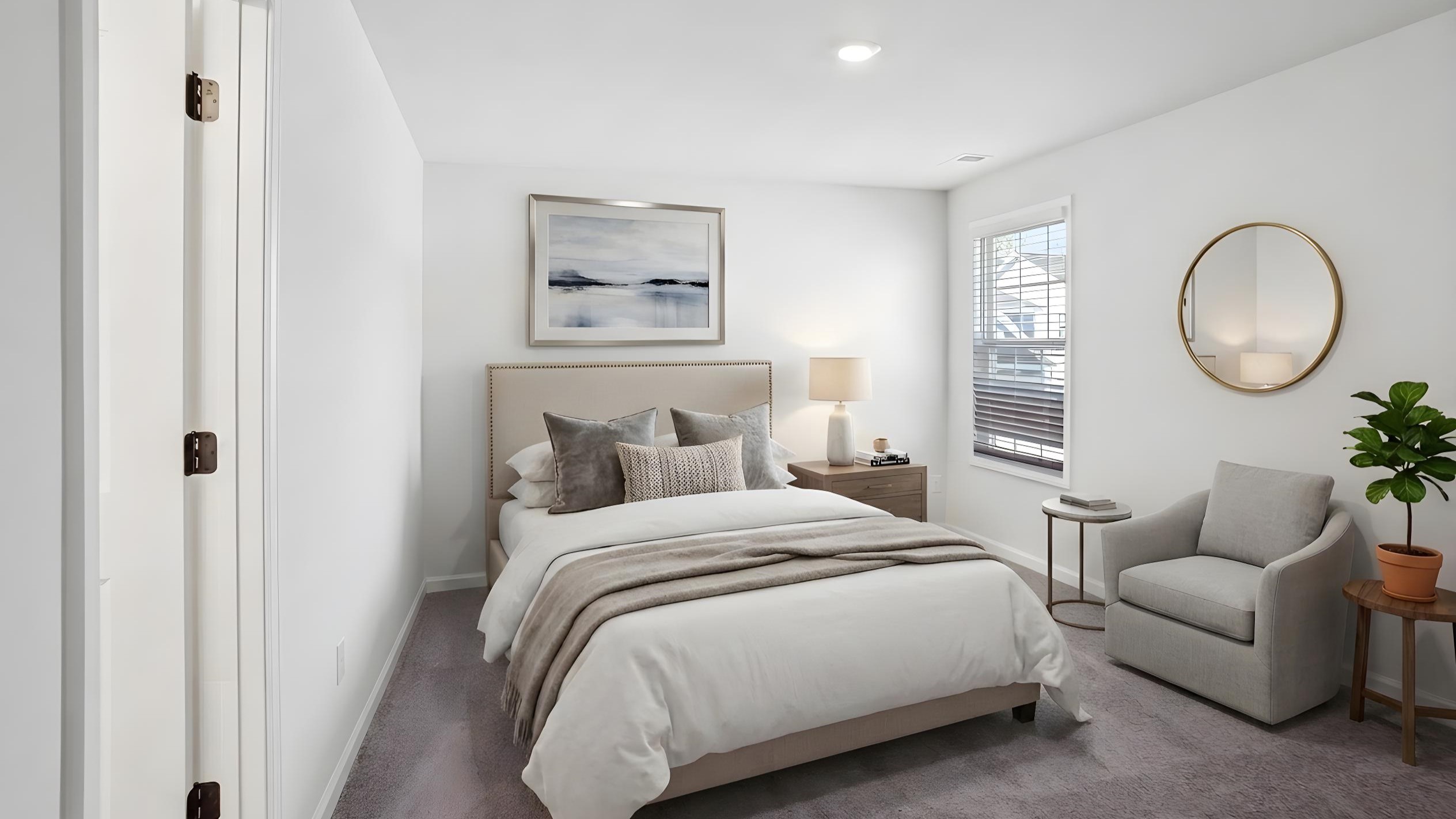 Carpeted bedroom with ceiling fan and small window