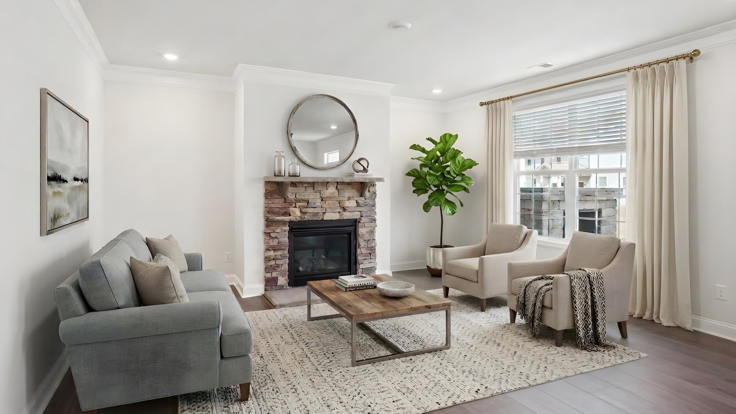 Open concept living room with large windows