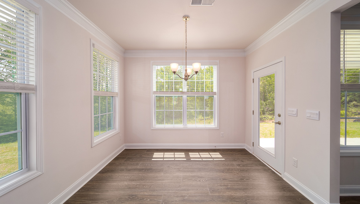 Breakfast area with large windows surrounding