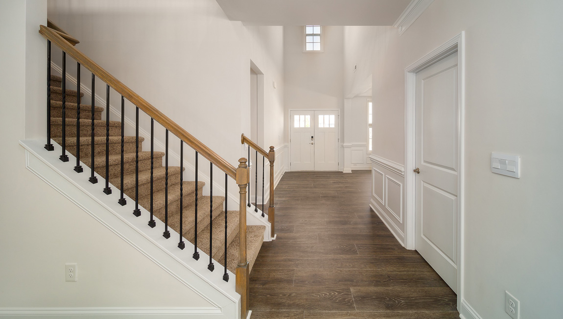 Welcoming foyer with staircase