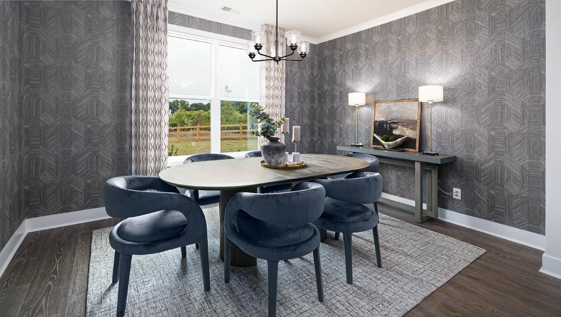 Dining room with wood floors and large window