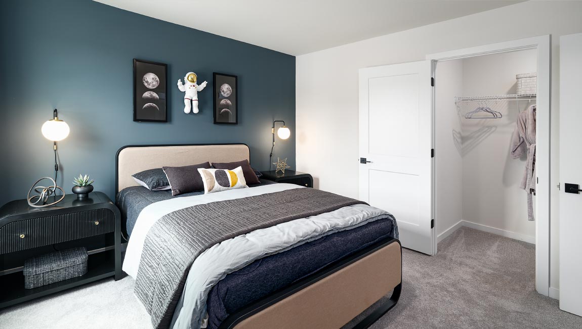 Carpeted bedroom with windows