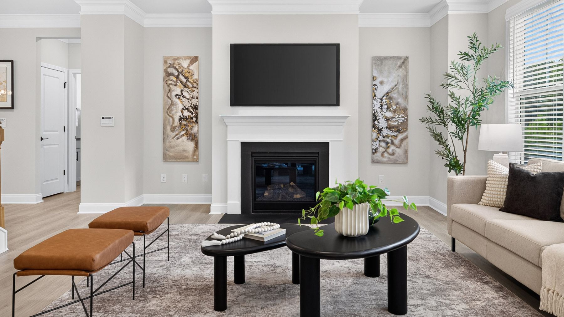 Open concept Living room with large windows and fireplace