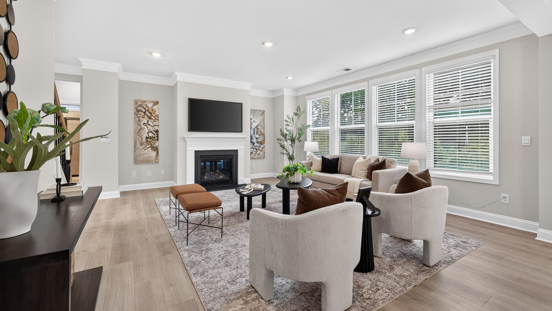Open concept Living room with large windows and fireplaceOpen concept Living room with large windows and fireplace
