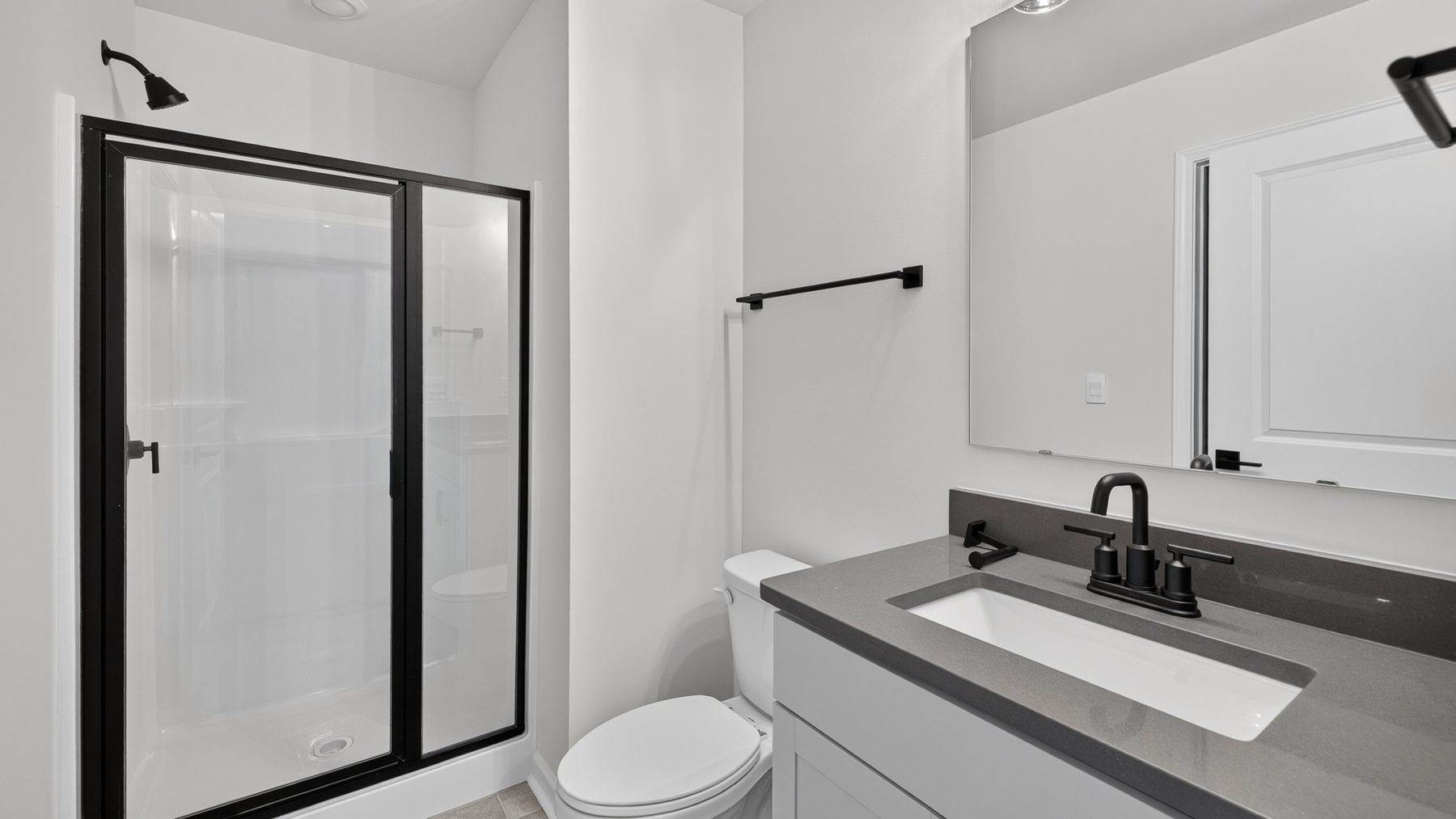 Bathroom with standing glass shower