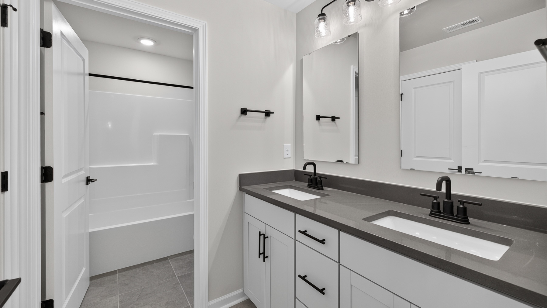 Bathroom with tub shower combination