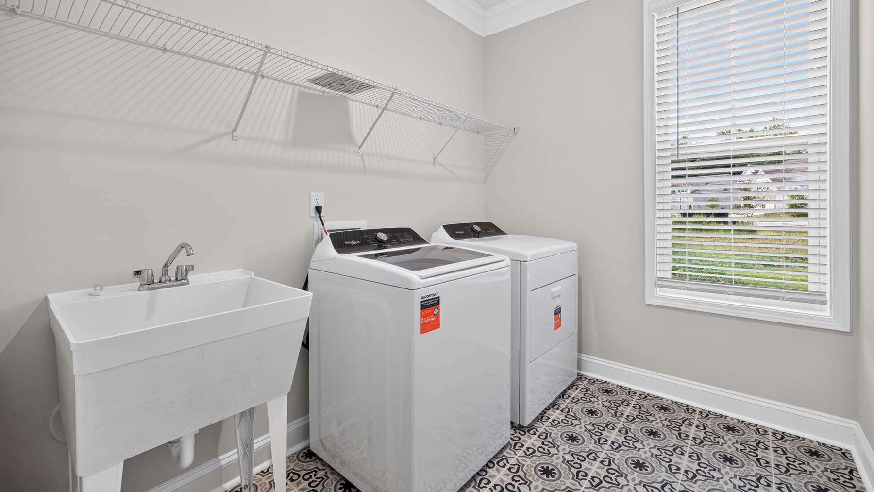 Laundry room with sink