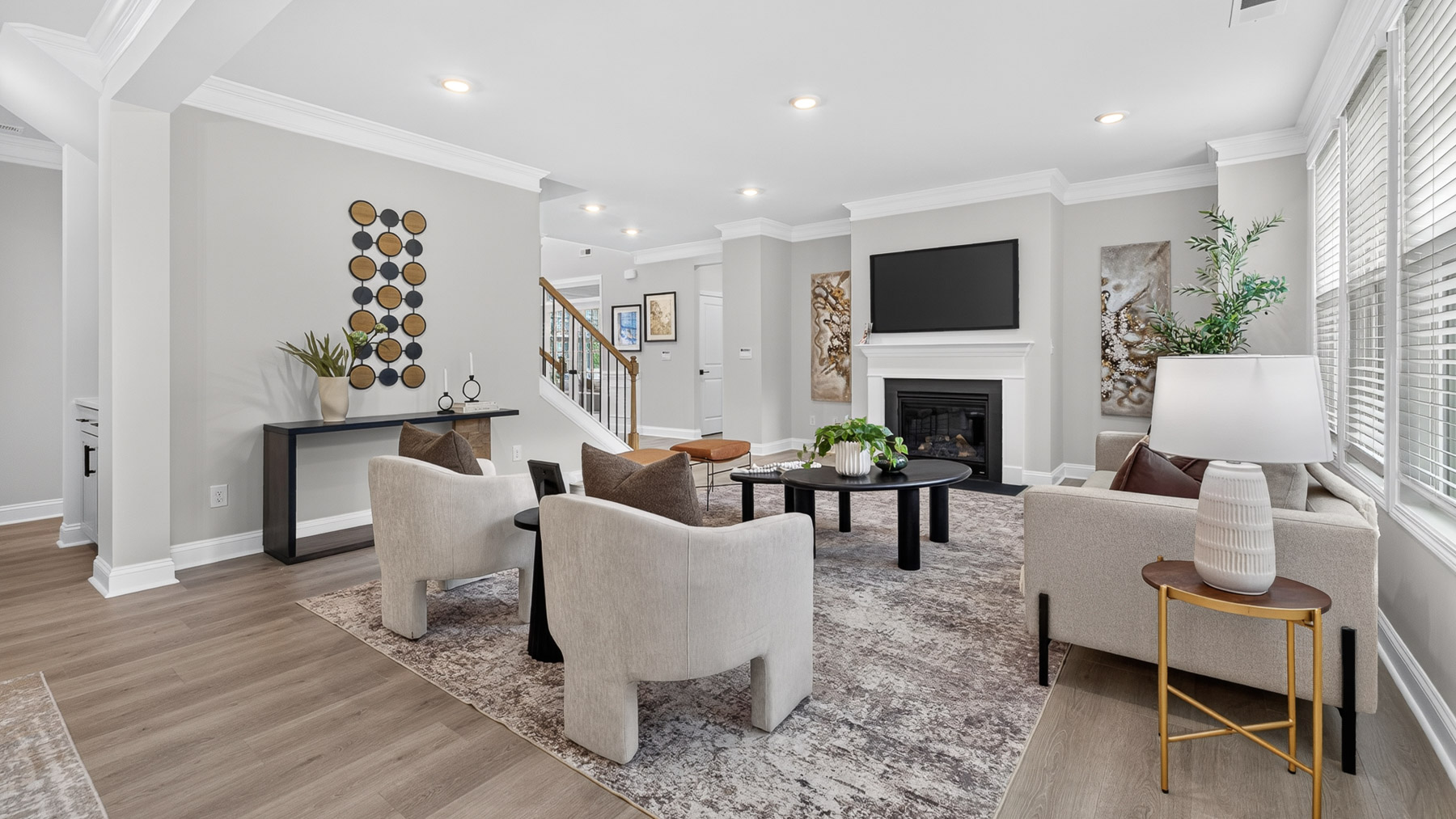 Open concept Living room with large windows and fireplace
