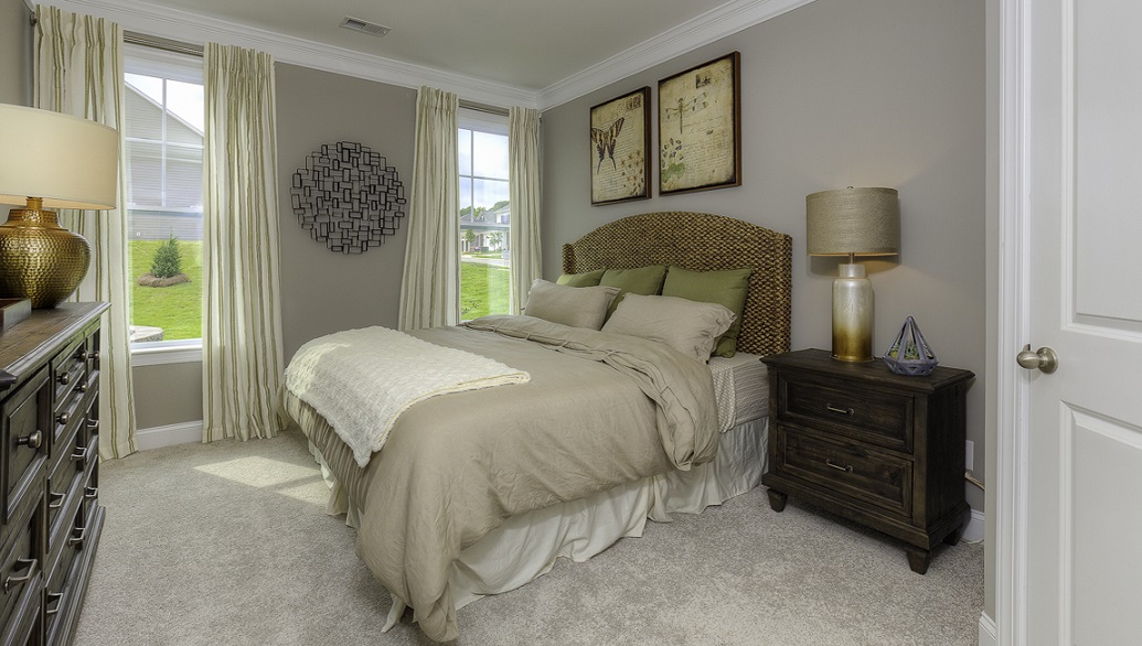Guest suite with carpet and two large windows