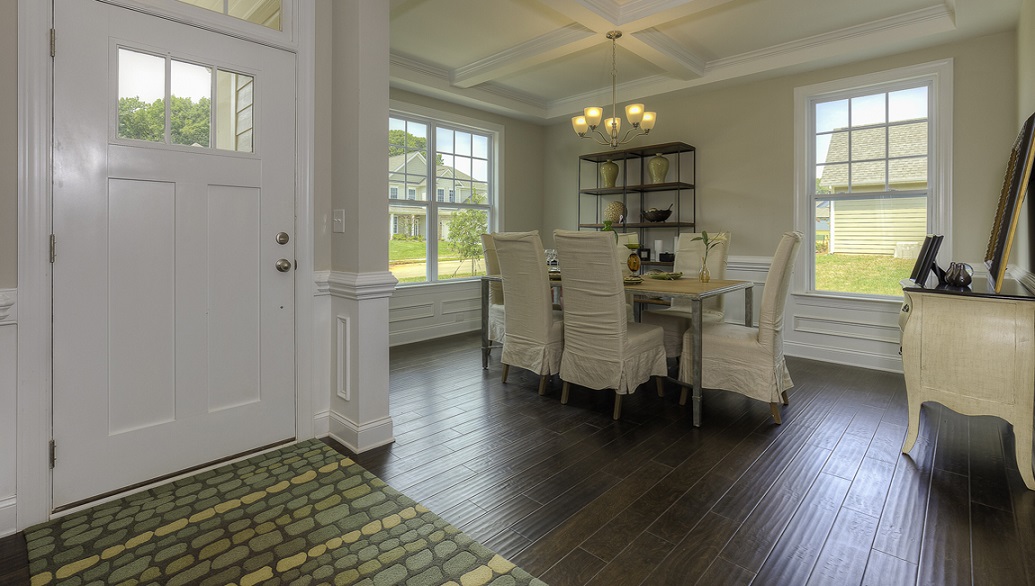 Welcoming foyer, view of dining room and front door