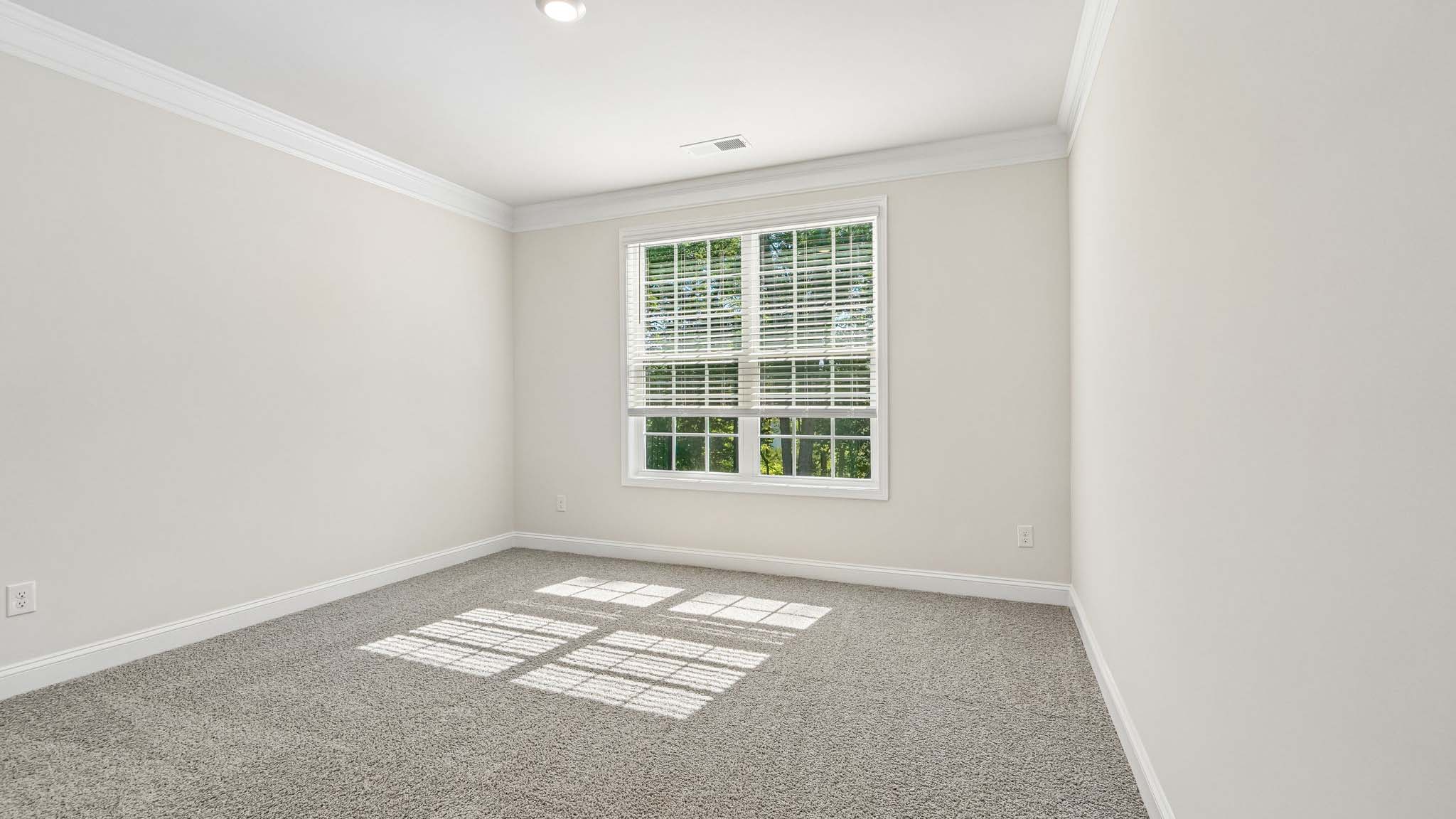 Carpeted bedroom